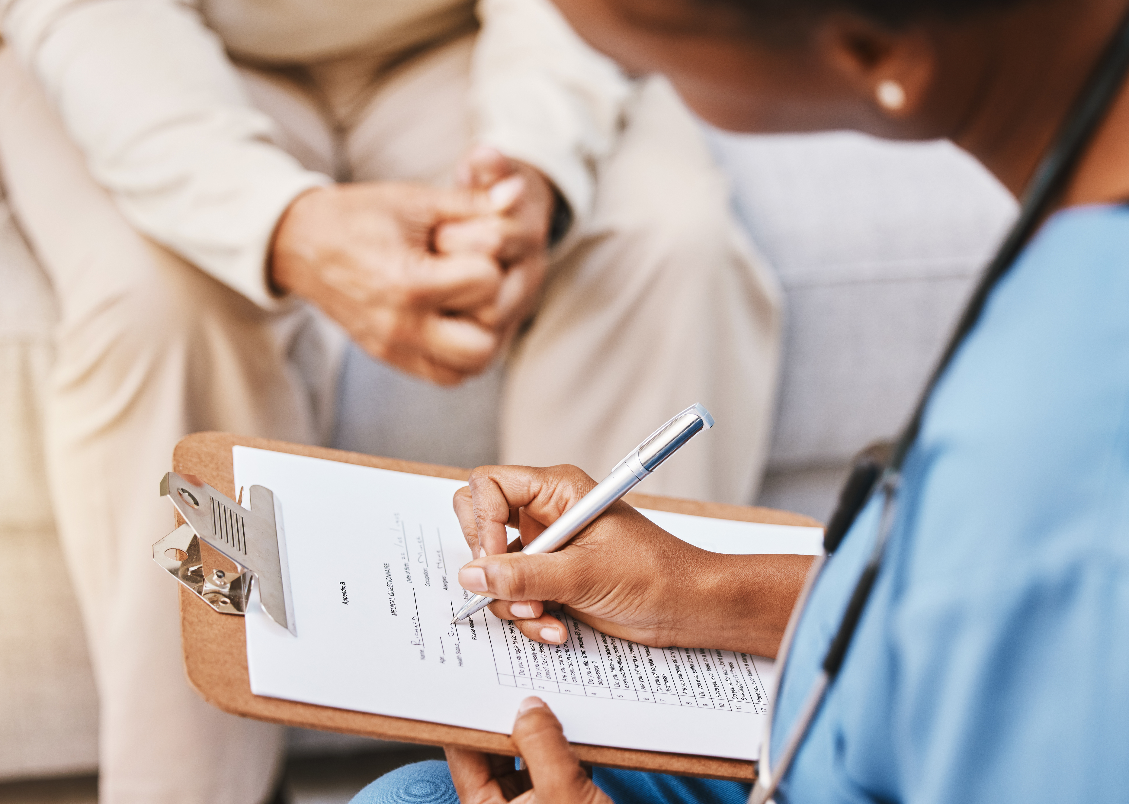 research nurse talking to patient